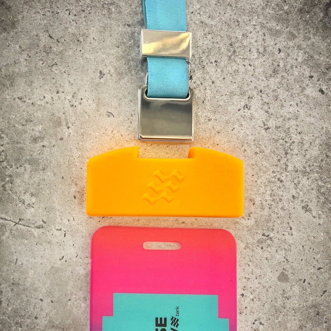 Badge holders, reels and accessories for motorsport credentials